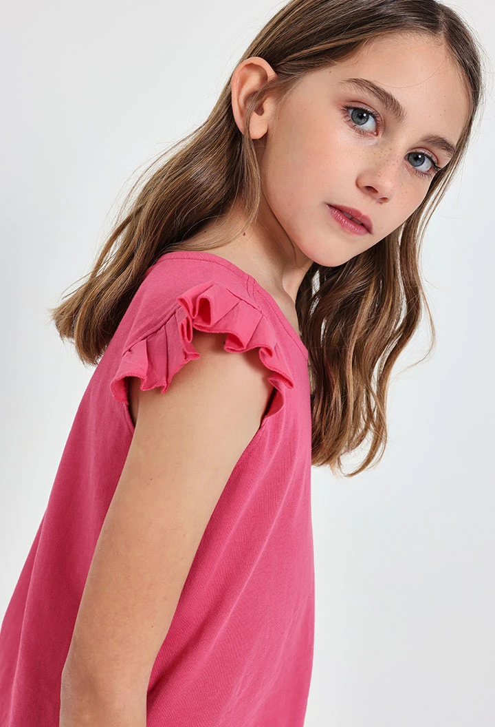 T-shirt en maille pour fille de couleur fraise.