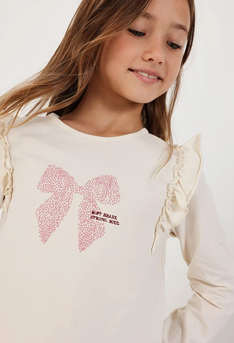 Mädchen-Strickshirt in Naturweiß mit rosa Schleifenaufdruck