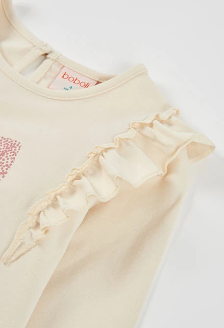 Girl\'s ecru knit T-shirt with pink bow print