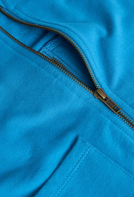 Chaqueta de felpa para niña en azul baltico