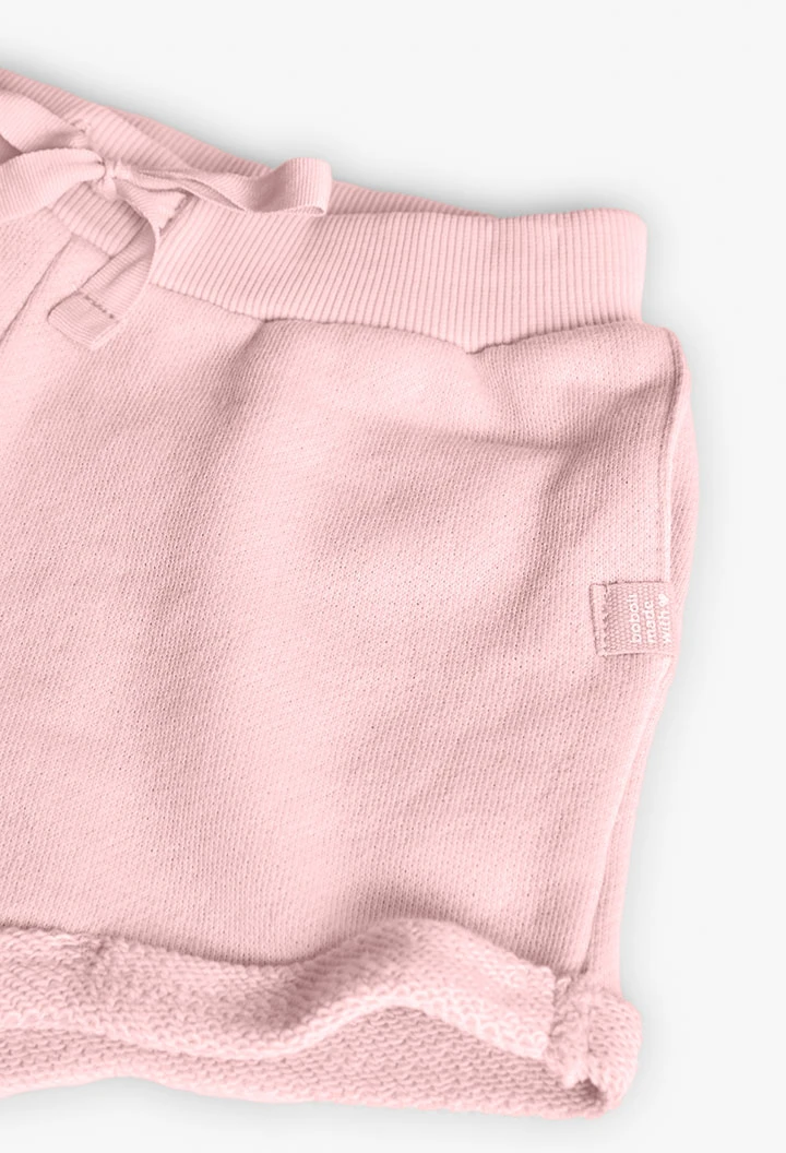 Short in felpa per bambina di colore rosa.