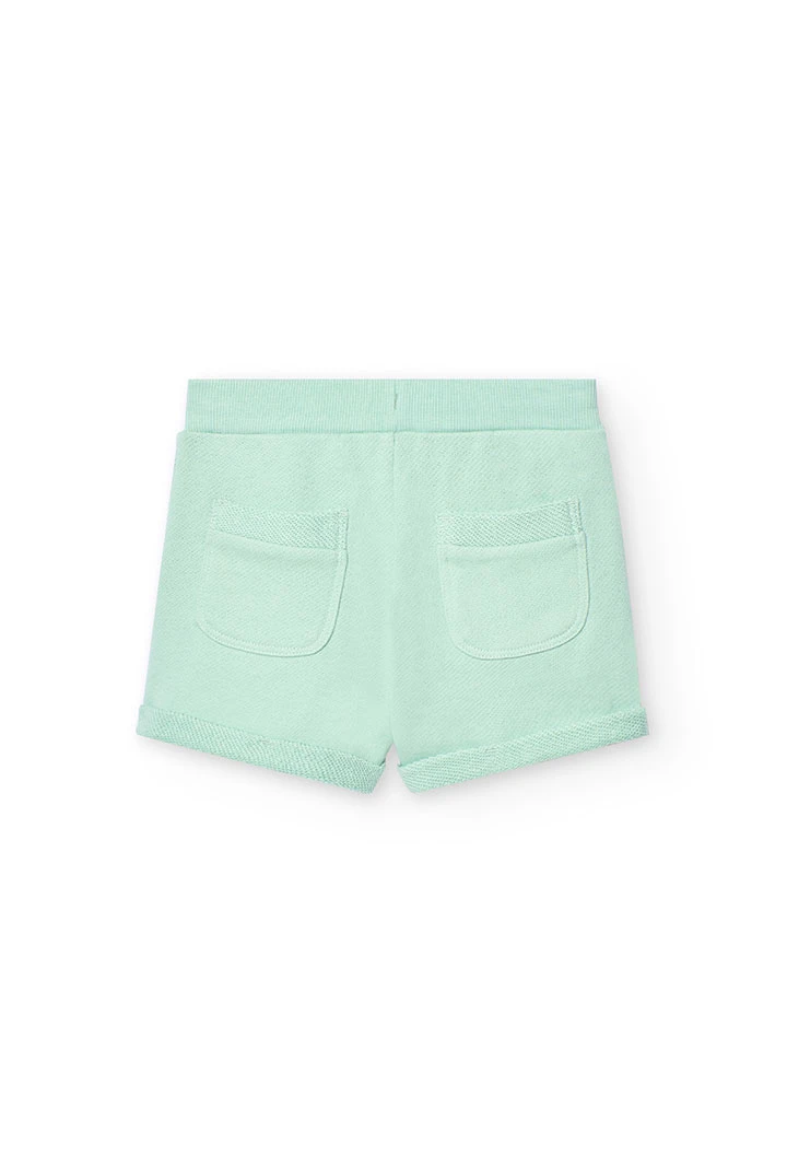 Shorts in felpa per bambina di colore verde.