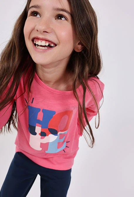 Camiseta niña de punto rosa estampado