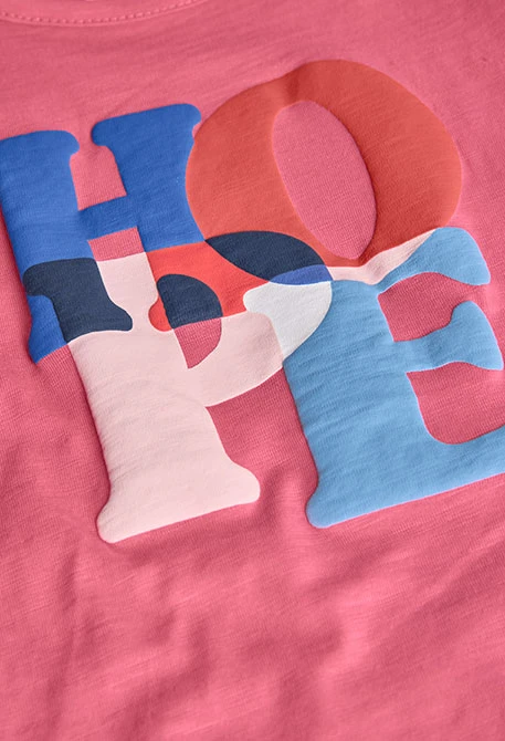 Camiseta niña de punto rosa estampado