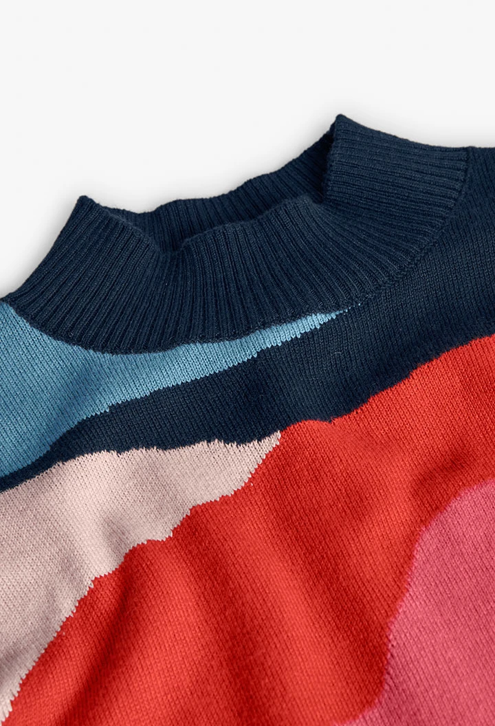 Maglione arancione in maglia bambina