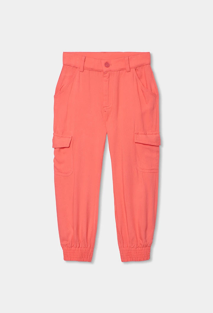 Girls’ cargo trousers in strawberry color
