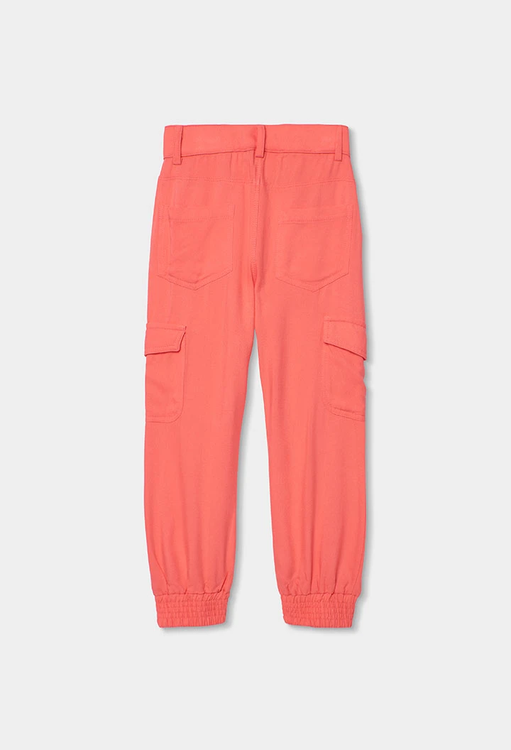 Girls’ cargo trousers in strawberry color