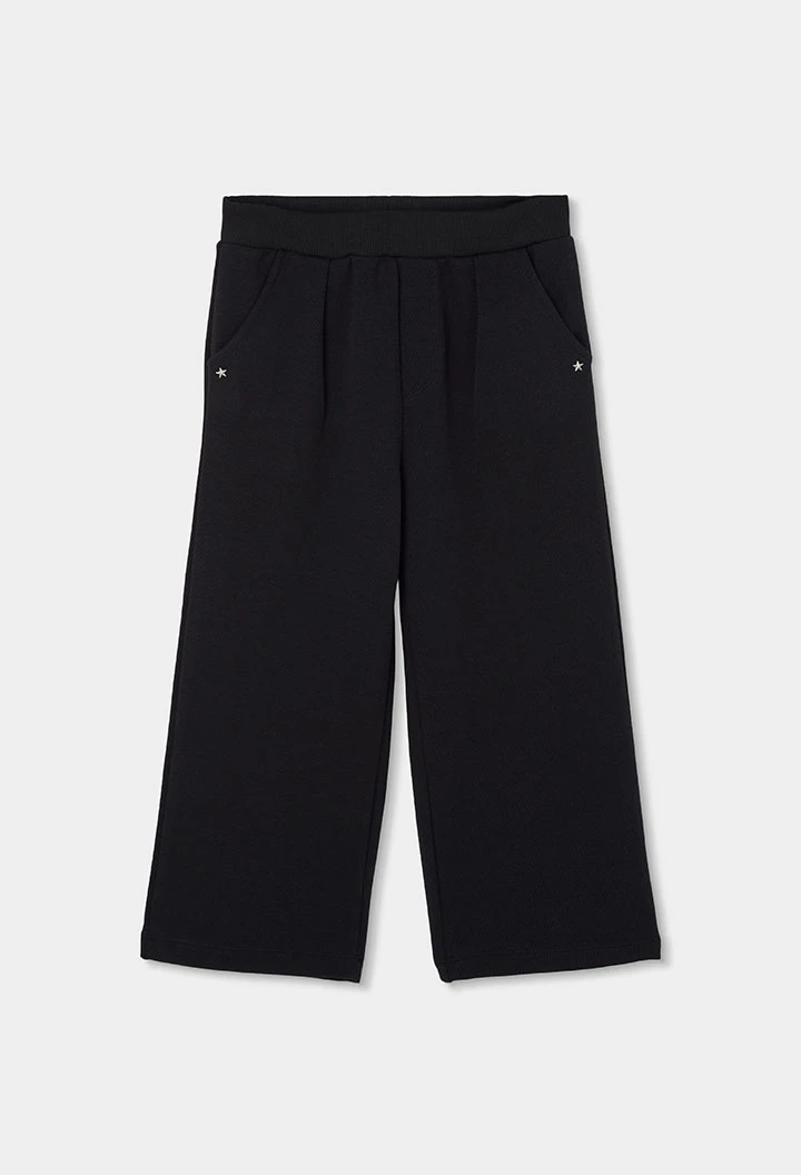 Pantalón punto niña negro con estrellas