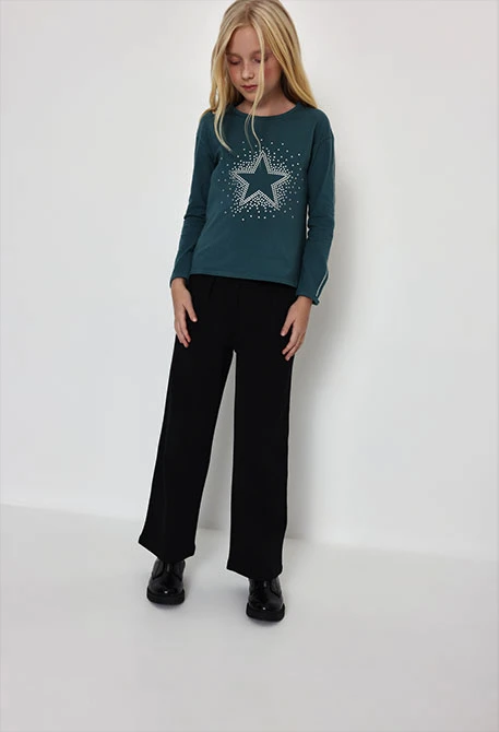 Pantalón punto niña negro con estrellas