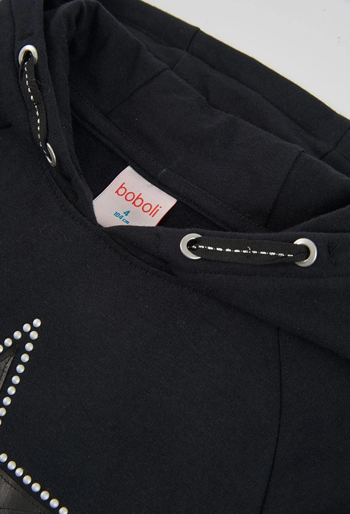 Vestito in spugna nero con stella e cappuccio