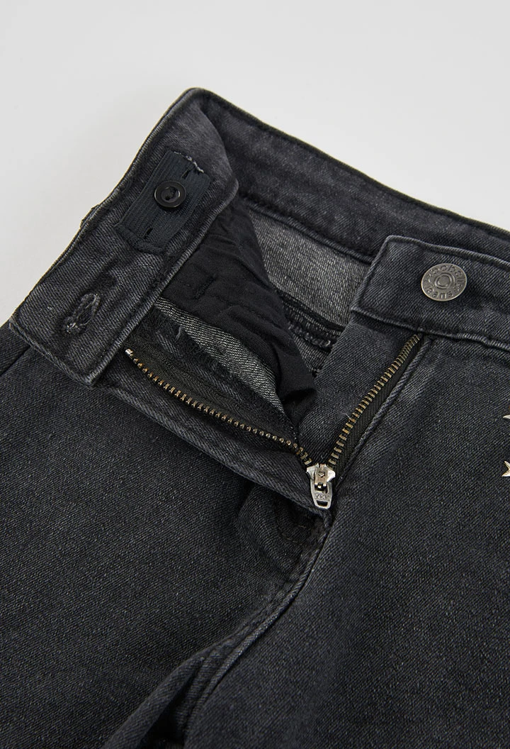 Pantalón denim cargo niña negro con estrellas