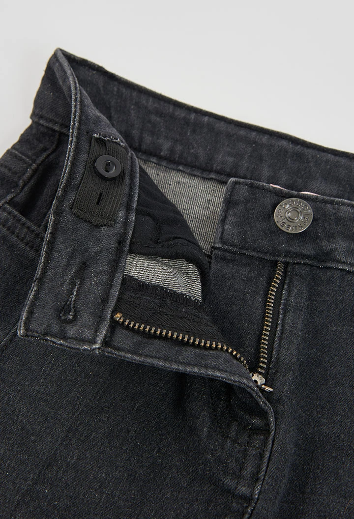 Gonna denim nera con tasche