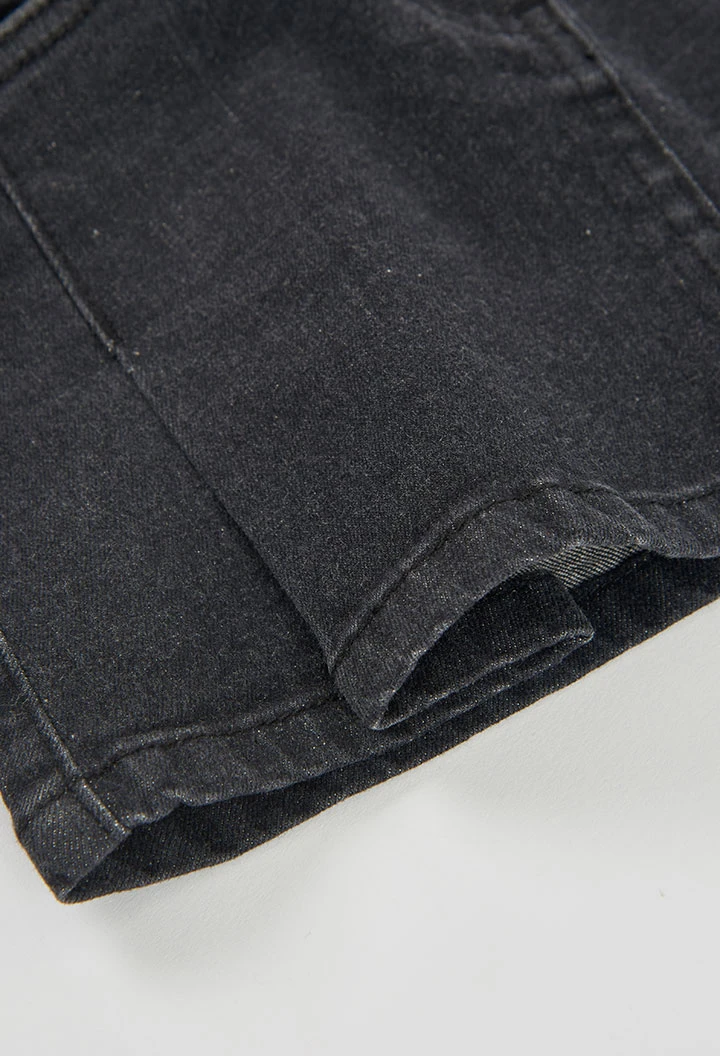 Gonna denim nera con tasche