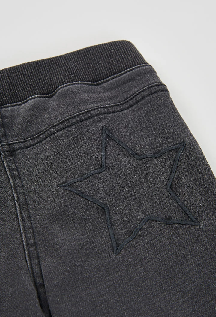 Pantalón denim niña negro con estrellas