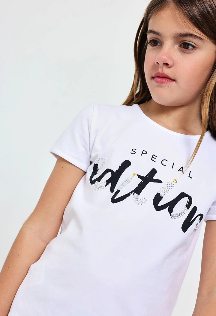 Maglietta di maglia elastica per bambina di colore bianco
