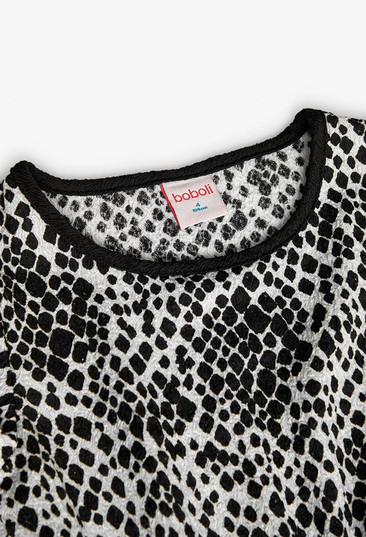 Abito in maglia per bambina con stampa in bianco e nero.