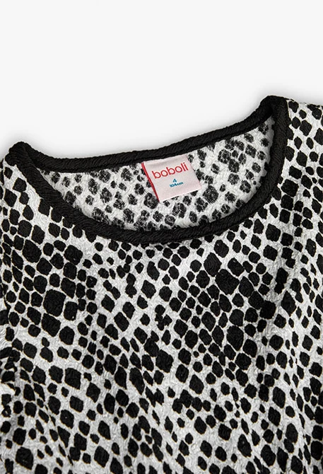 Robe en maille pour fille avec imprimé en blanc et noir.
