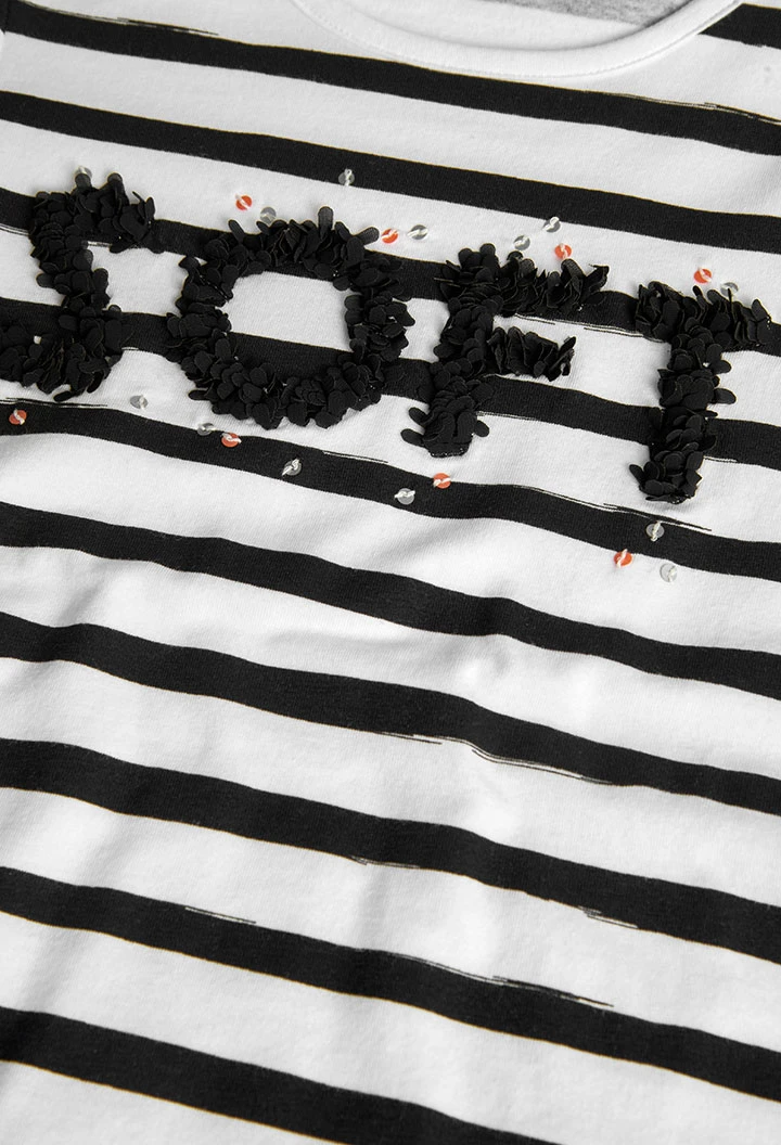 Maglietta a maglia per bambina con design a righe nei colori bianco e nero