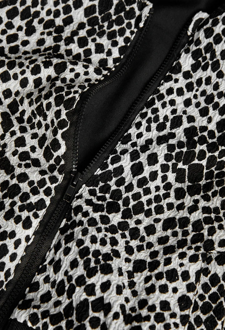 Knitted jacket for girl in black and white print