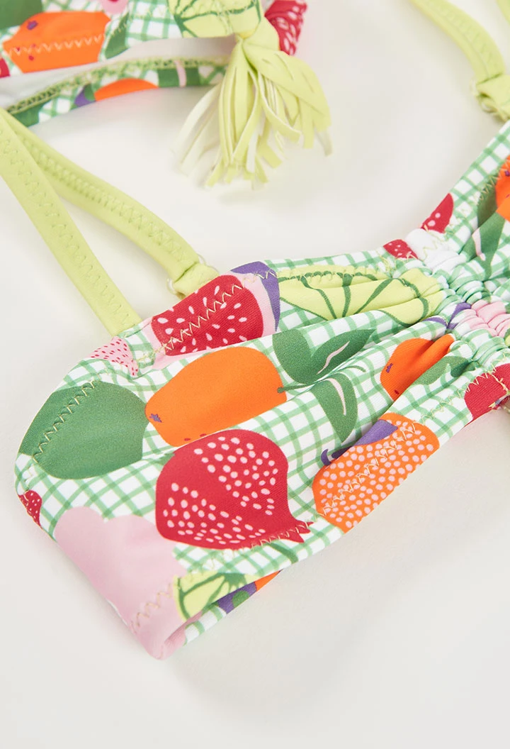 Girl?s swimsuit with apple print