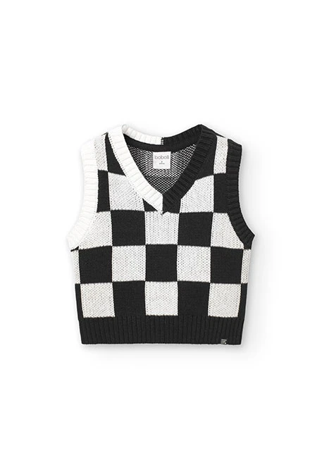 Knitted vest for girls with black and white check pattern