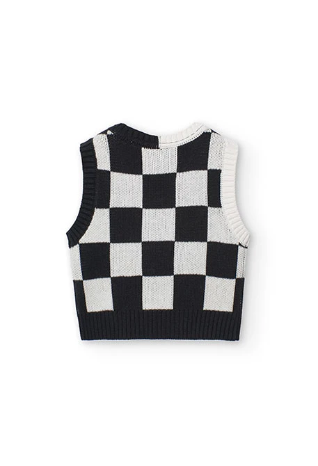 Knitted vest for girls with black and white check pattern