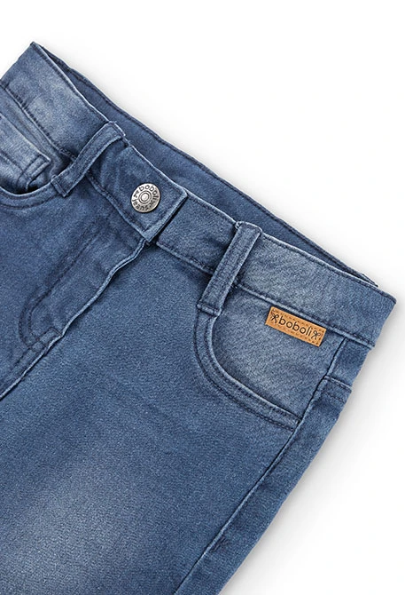 Pantalón tejano elástico de niña en color azul