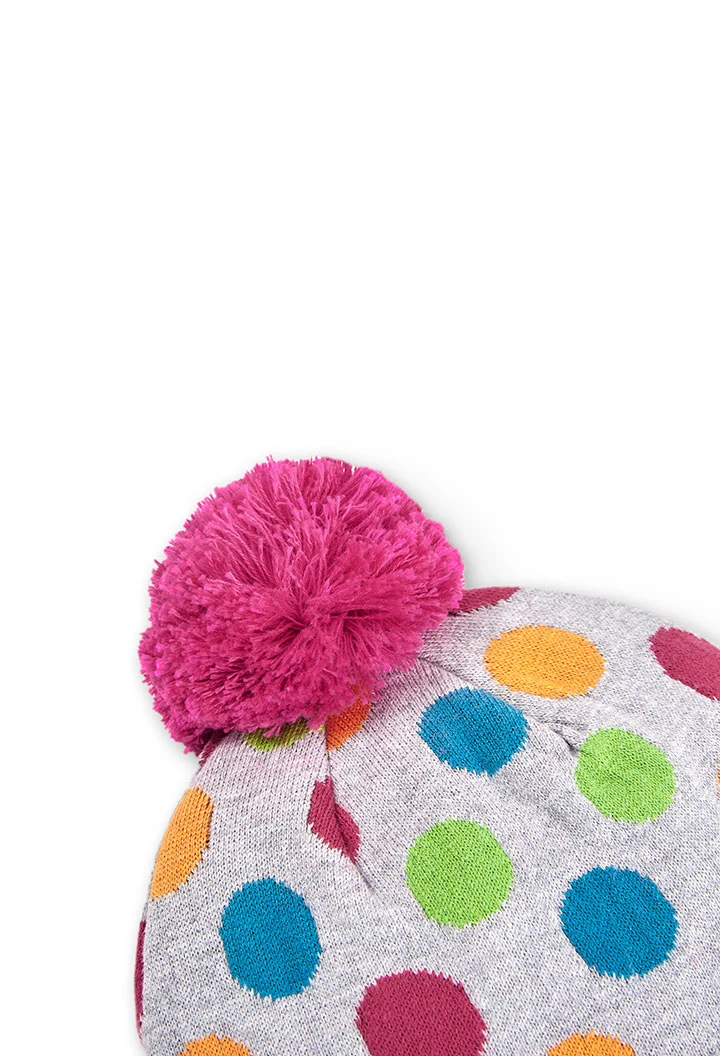 Bonnet tricoté a pois pour fille