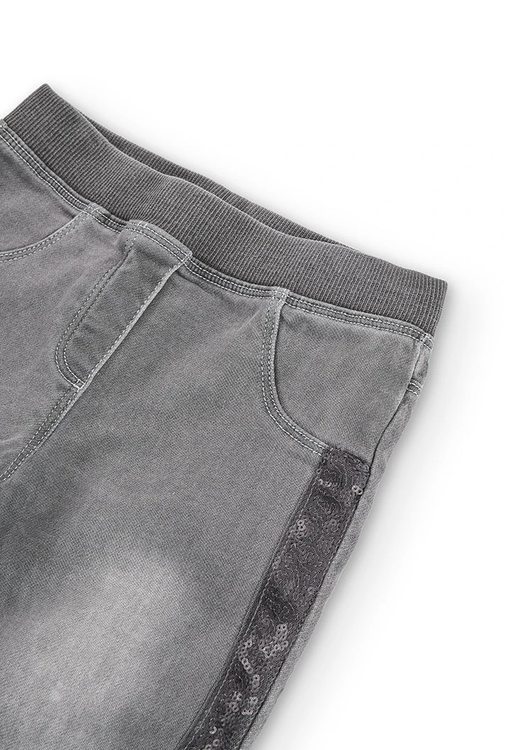 Pantalón denim punto elástico de niña en gris