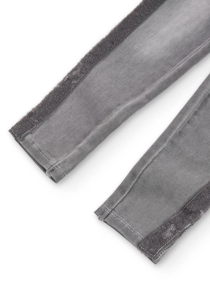 Pantalón denim punto elástico de niña en gris