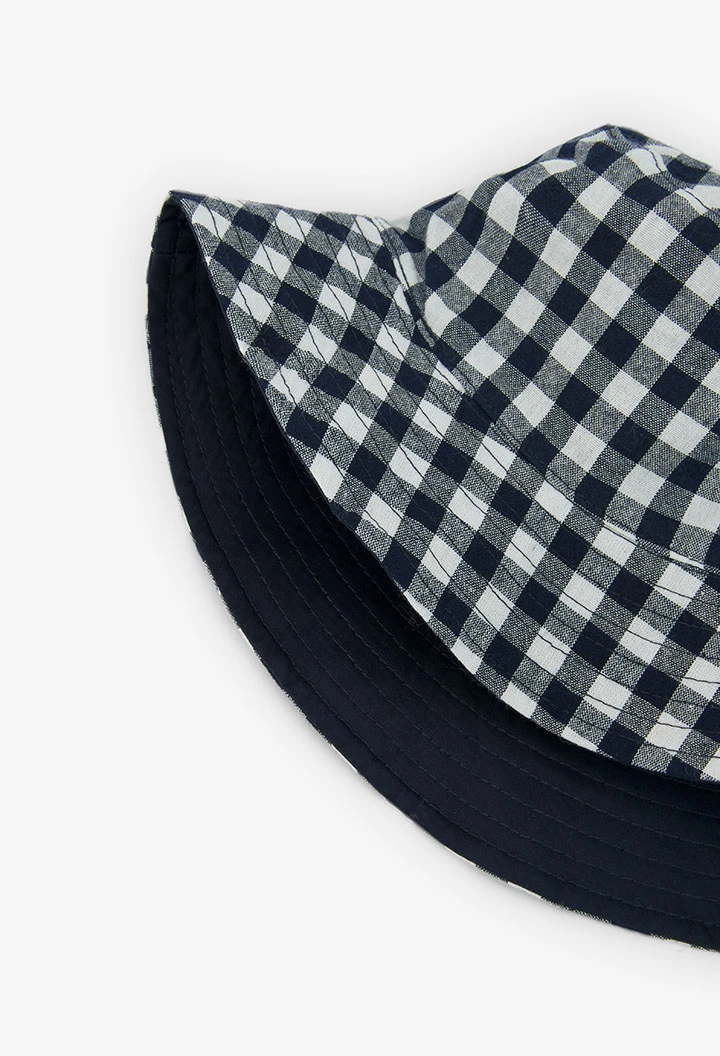Bonnet réversible à carreaux