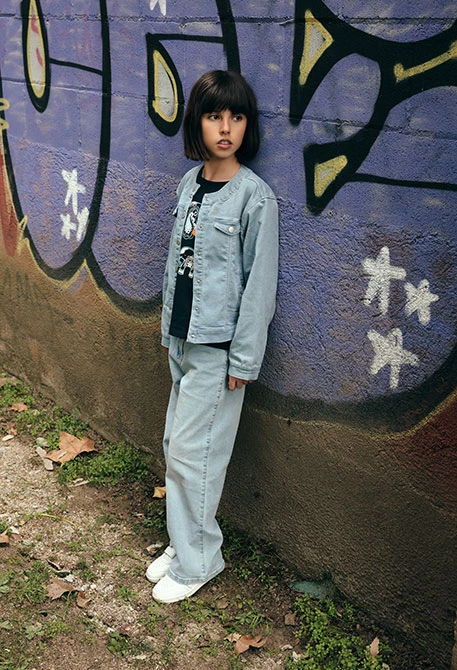 Pantaloni bambina in denim elasticizzato bleach