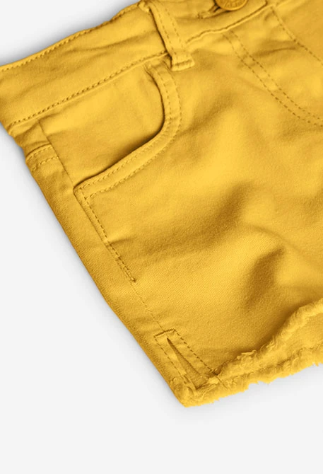 Shorts de sarga elástica para niña en color amarillo