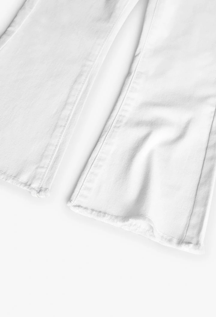 Pantaloni svasati da bambina di colore bianco