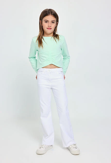 Pantaloni svasati da bambina di colore bianco