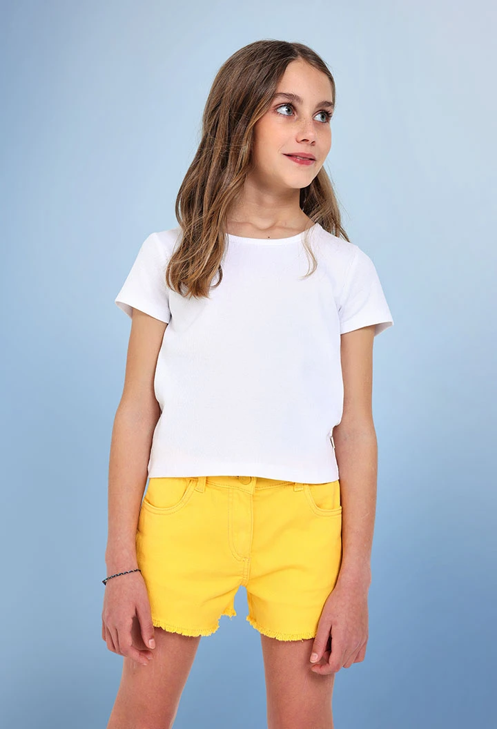 Maglietta di base in maglia per bambina di colore bianco.