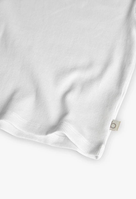 Maglietta di base in maglia per bambina di colore bianco.