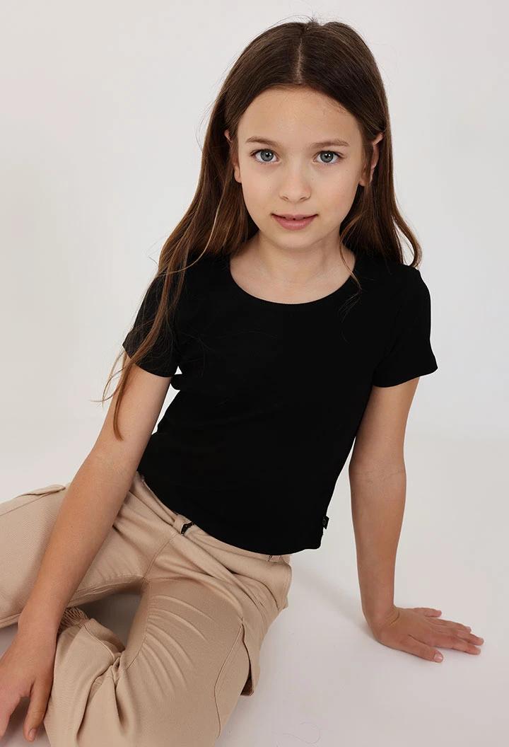 Maglietta a maglia per bambina di colore nero.