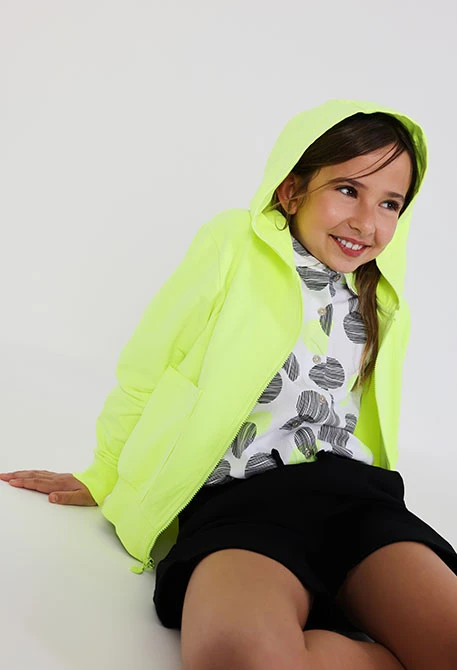 Giacca bambina con cappuccio in verde fluo