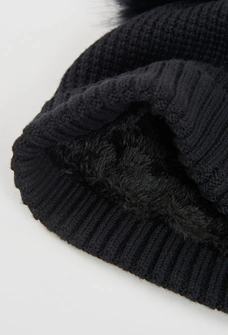 Black hat with pompoms