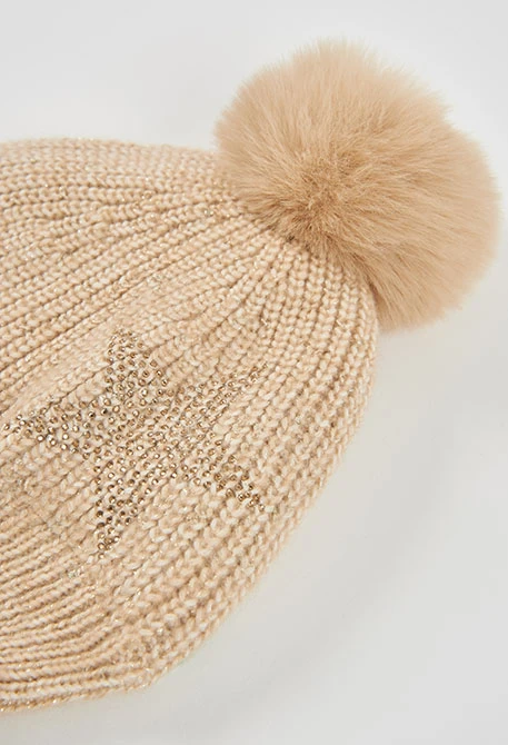 Yellow hat with star and pompom