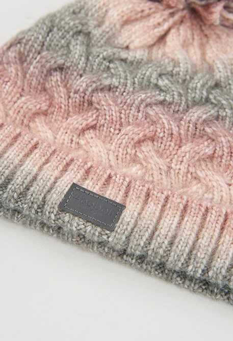 Pink braided hat with pompom