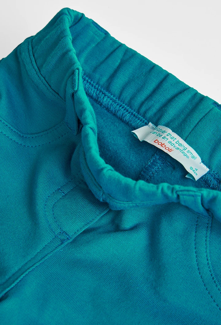 Pantalón felpa elástica básico de niña color laguna
