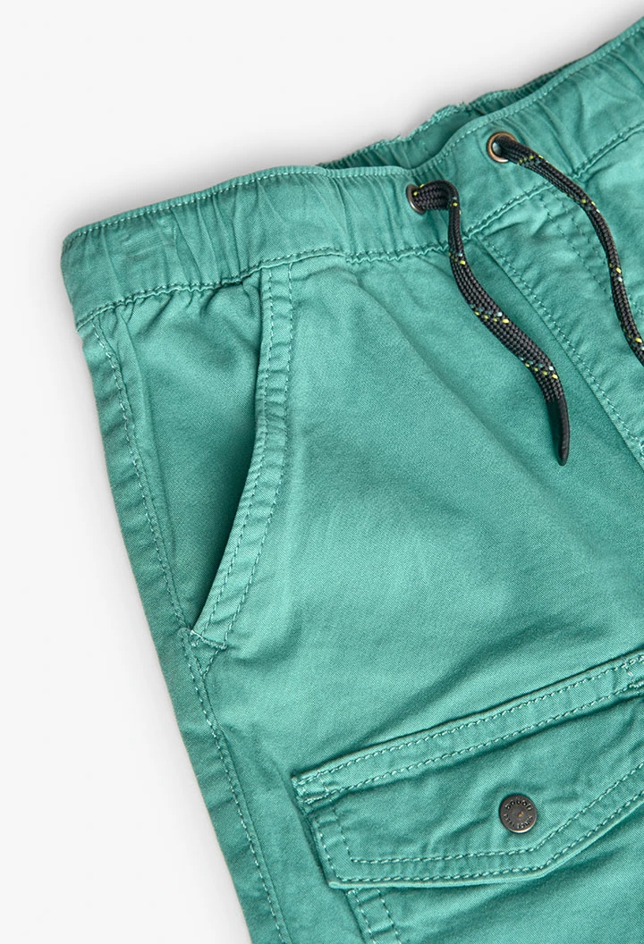 Elastic cargo trousers for boys in green colour