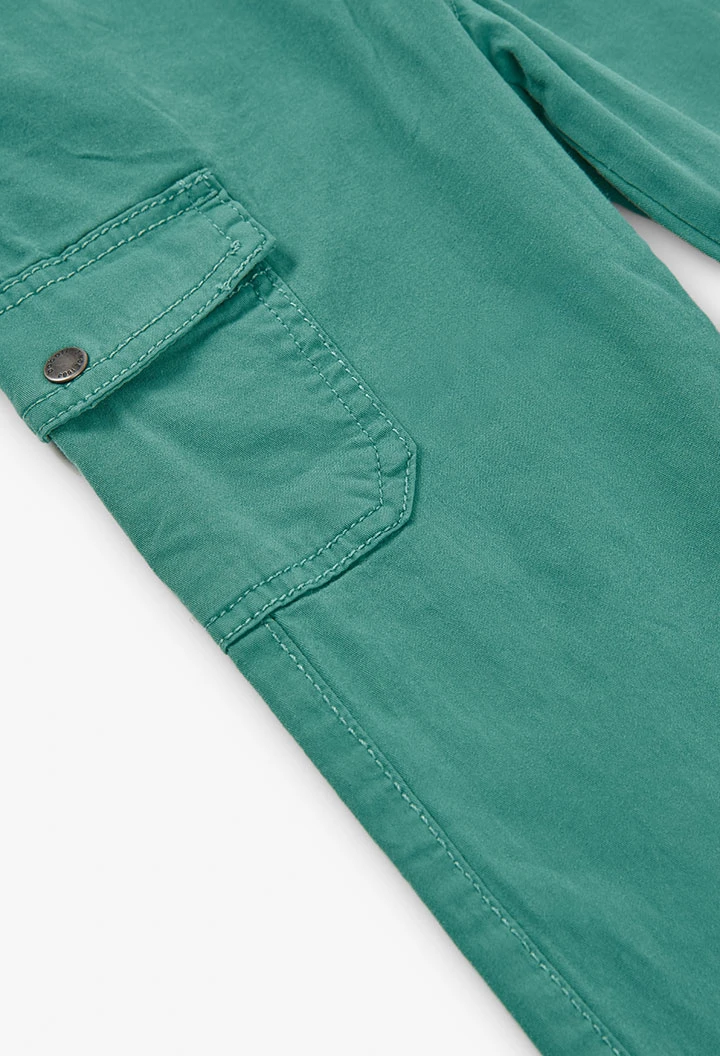 Elastic cargo trousers for boys in green colour