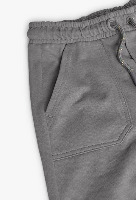 Pantalone jogger in felpa per bambino di colore grigio