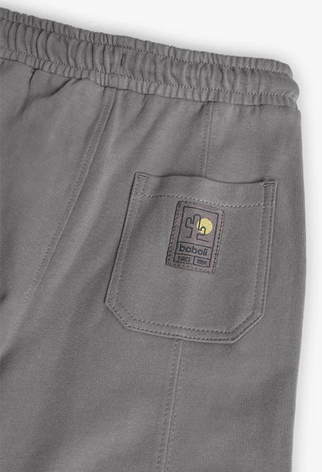 Pantalone jogger in felpa per bambino di colore grigio