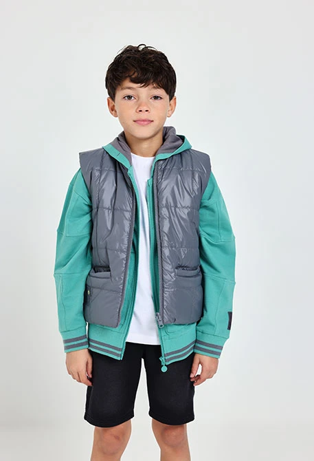 Armilla reversible per a nen en color gris i verd