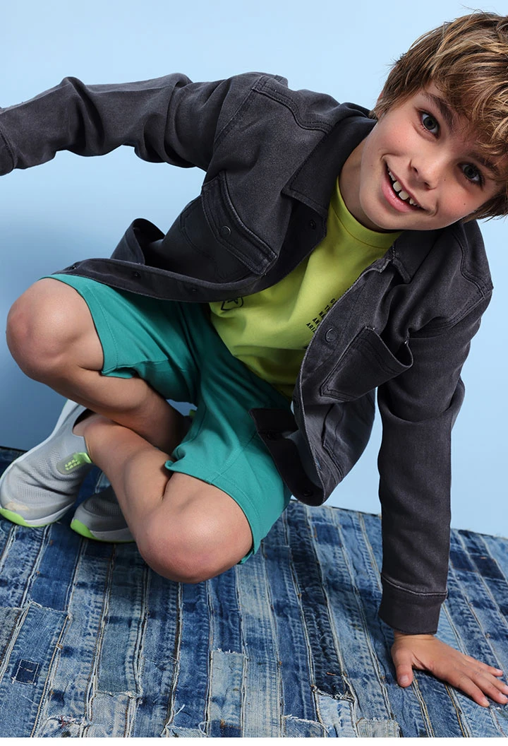 Giacca di jeans a maglia per bambino in colore grigio