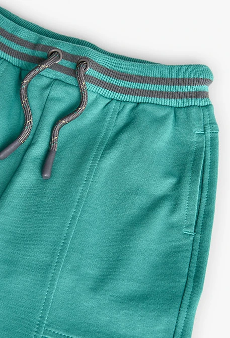 Bermuda in felpa per bambino di colore verde
